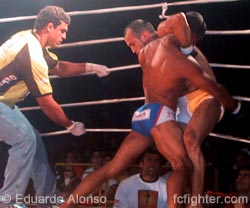 Belfort referees Guerreiro (right, against the ropes) vs. Capoeira