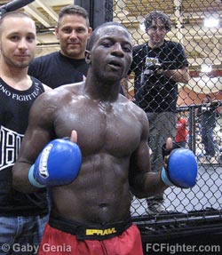 Combat in the Cage (Sep 2, 2006): Daniel Akinyemi (Rhino Fight Team) victorious over Ross Atwood - Photo by Gaby Genia