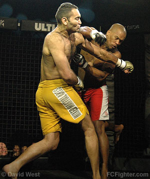 Intense Fighting (Jan 27, 2007): Antonio Samurai (left) slugs Eric Cebarec - Photo by Zack Lynch