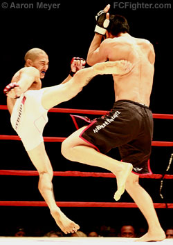 Icon Sport 48: Mark Oshiro kicking Tyson Nam - Photo by Aaron Meyer