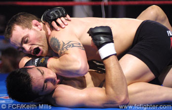 Jens Pulver on top of Robert Emerson