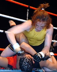 Kaufman (top) punching Posener