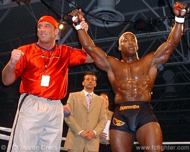 Jubilant coach/friend Mark Coleman with victorious Kevin Randleman