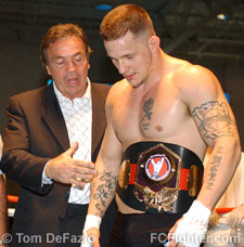 Promoter Louis Neglia presents Dante Rivera with the Super-Cruiserweight Title belt
