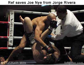 Ref saves Joe Nye from Jorge Rivera