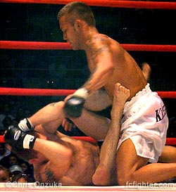 Kid Yamamoto punching Jeff Curran