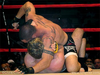Ron Jhun pounding on Kyle Brees