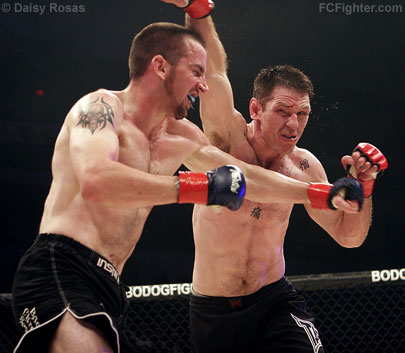 Strikeforce 3: Eric Wray (left) trading punches with Jason Von Flue - Photo by Daisy Rosas