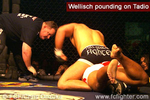 Christian Wellisch pounding on Dennis Tadio from the back mount