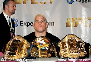 Tito Ortiz with his championship belts