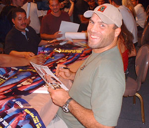 Randy Couture signing autographs