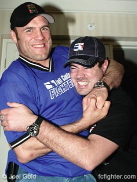 Randy Couture putting the squeeze on Carson Daly