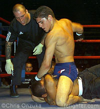 Nick Diaz punching Harris Sariento from mount